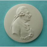 Frederick the Great: a Berlin porcelain circular white bisque medallion moulded with a likeness,
