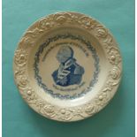 1820 George III in Memoriam: a small pearlware nursery plate with floral moulded border printed in