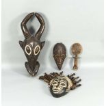 Konvolut von 3 Masken und einer Figur, Afrika, Mitte 20. Jh., versch. Hölzer geschnitztund