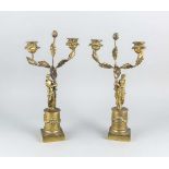 Paar Figürliche Leuchter d. 19. Jh., Bronze mit Restvergoldung, partiell poliert, 2-flg.,hohes,