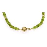 Peridot-Collier mit Kugelschließe 10 mm und Goldkugeln 5 mm in GG 585/000, fac.Peridotrondelle 6 mm,