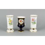 Drei Vasen, Meissen, Marken nach 1970, 1. W., 2 Ofenvasen mit polychromer Malerei, DekorBlume 2 ,