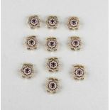 Zehn Perlenkettenschlösser in Blütenform, 20. Jh., Sterlingsilber 925/000, vergoldet,