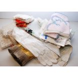 A BASKET OF MIXED VINTAGE LINEN AND COTTONS TO INCLUDE LADY'S GLOVES, BABY'S VESTS,