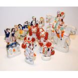 A COLLECTION OF 11 PIECES OF STAFFORDSHIRE POTTERY TO INCLUDE PAIR OF SPANIELS,