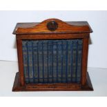 SMALL ARTS AND CRAFT STYLE BOOK CASE AND CONTENTS, 12 VOLS THE METHODIST MISSIONARY LIBRARY,