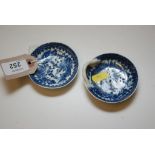 A CAUGHLEY BLUE AND WHITE CIRCULAR STRAINER PRINTED WITH FISHERMEN PATTERN WITH SHELL HANDLE AND