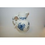 A LARGE WORCESTER BLUE AND WHITE CABBAGE LEAF JUG PAINTED WITH FLOWERS (CRACK TO RIM) HEIGHT 29.