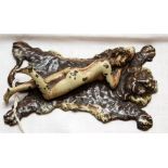 AUSTRIAN COLD PAINTED BRONZE "LADY ON ANIMAL SKIN RUG",