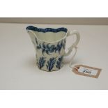 A WORCESTER CREAM JUG OF EWER FORM WITH INNER CELL BORDER,