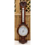 VICTORIAN MAHOGANY CASED ANEROID BAROMETER WITH ORNATE CARVED DETAIL