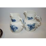 TWO 18TH CENTURY MASKED JUGS, CAUGHLEY PRINTED IN UNDERGLAZE, BLUE WITH FLOWERS,