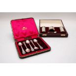 CASE CONTAINING FIVE SILVER TEASPOONS AND A CASED THREE PIECE SILVER CRUET WITH FACETED SIDES AND A