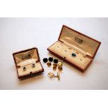A CASED SET OF FOUR AND A CASED SET OF TWO 18CT GOLD AND PLATINUM BUTTON AND COLLAR STUDS AND THREE