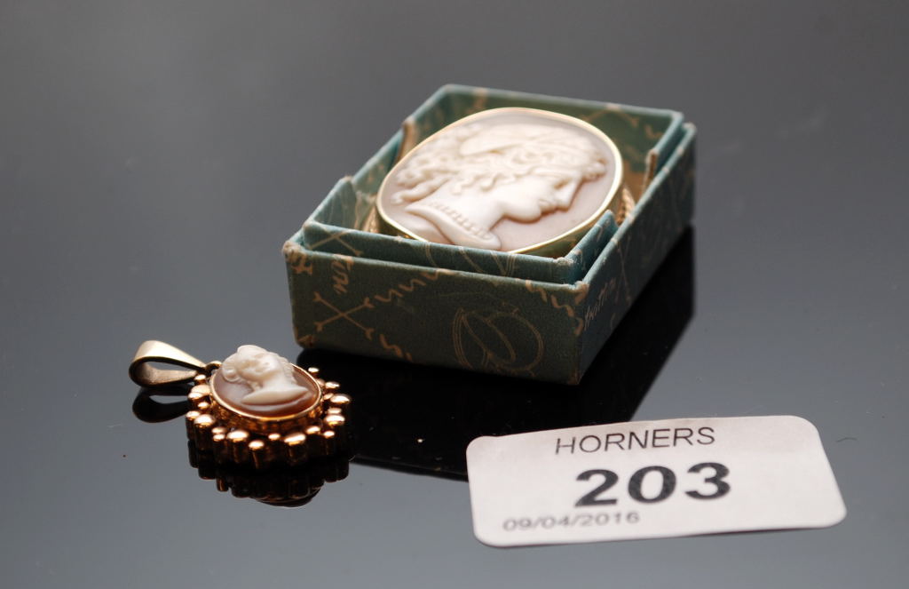 A 9CT GOLD CAMEO PENDANT AND A CAMEO BROOCH,