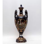 CONTINENTAL BLUE GLAZE TWO HANDLED URN WITH CLASSICAL SCENE PANELS