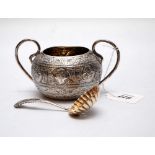 A SILVER SUGAR BOWL ALONG WITH AN ASSOCIATED SIFTER SPOON,