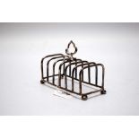 A SILVER TOAST RACK,