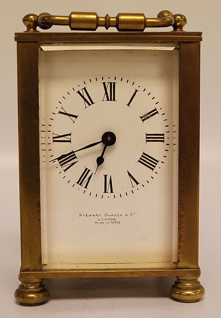 A MODERN BRASS CARRIAGE CLOCK WITH FRENCH MOVEMENT