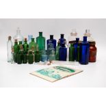 A COLLECTION OF VINTAGE BOTTLES TO INCLUDE MANY POISON (EMPTY) AND OTHERS