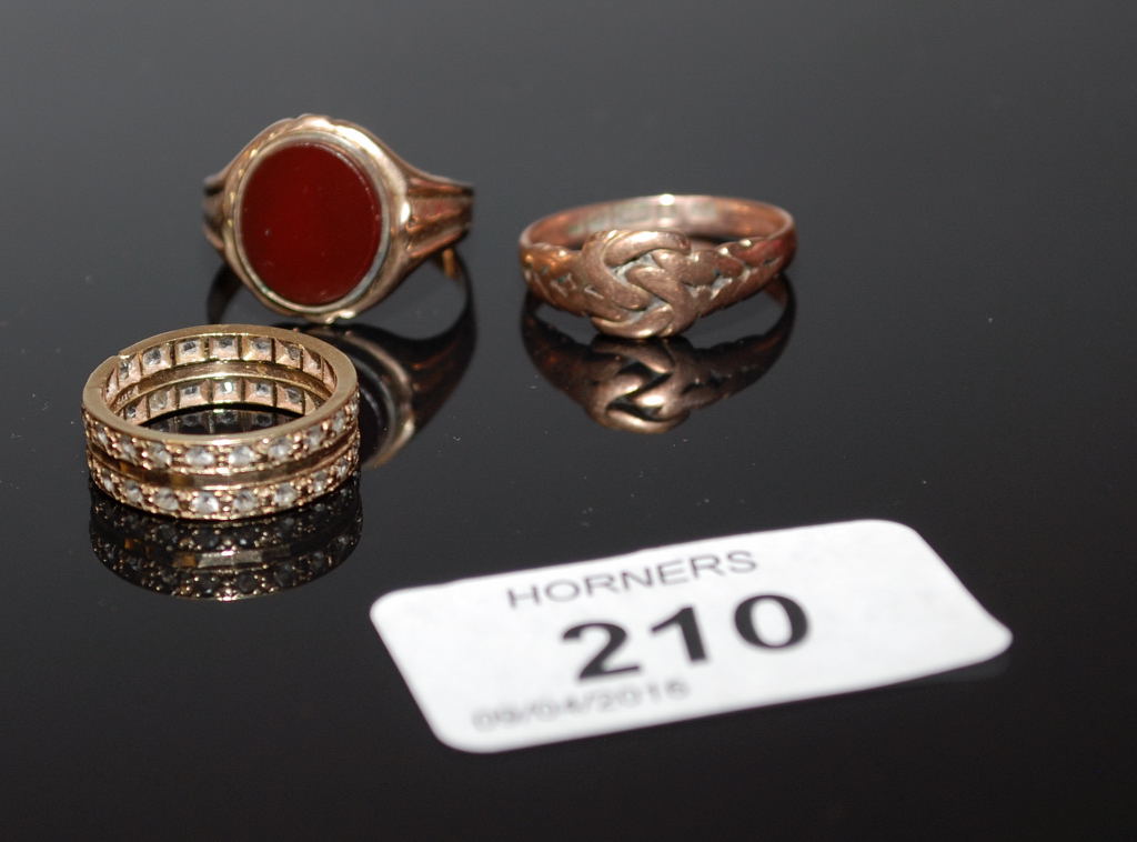 A 9CT GOLD CARNELIAN SIGNET RING , TWO 9CT GOLD RINGS, ONE SET WITH SMALL STONES,