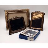 FOUR SILVER PHOTO FRAMES