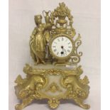 FRENCH ORNATE FIGURED CLOCK DECORATED WITH FEMALE FIGURE HOLDING AN URN AND ELABORATE FOLIAGE