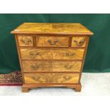 A 20TH CENTURY WALNUT FINISH CHEST OF THREE SHORT OVER THREE LONG DRAWERS,