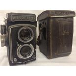 A VINTAGE WALZFLEX COPAL MXV CAMERA NO.37082 IN ORIGINAL LEATHER CASE.