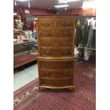 A 20TH CENTURY WALNUT CHEST ON CHEST OF SMALL PROPORTIONS,