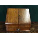 EARLY 20TH CENTURY OAK TWO DOOR STATIONERY CABINET WITH DRAWER TO BASE.