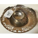 A SILVER CIRCULAR PART PIERCED SWEETMEAT DISH, THE SHAPED AND RAISED RIM, ON A CIRCULAR FOOT,