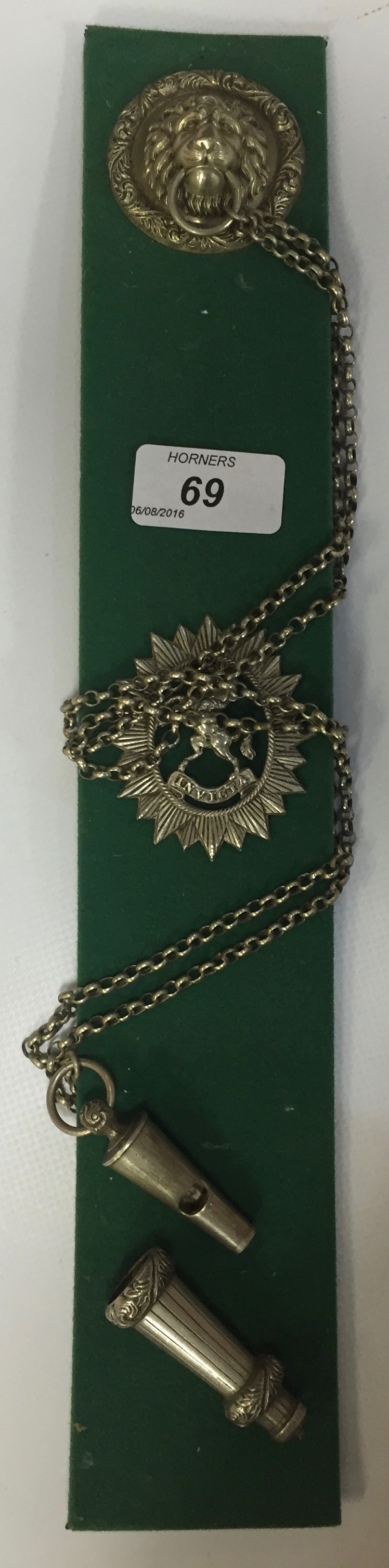KENT REGIMENT OFFICER'S CROSS STRAP WHISTLE ON CHAIN SUSPENDED FROM LION MASK