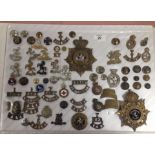 COLLECTION OF KENT RELATED MILITARY BADGES INCLUDING VICTORIAN WEST KENT HELMET PLATE AND THE ROYAL