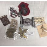 TIN CONTAINING VARIOUS PATCHES AND BADGES,