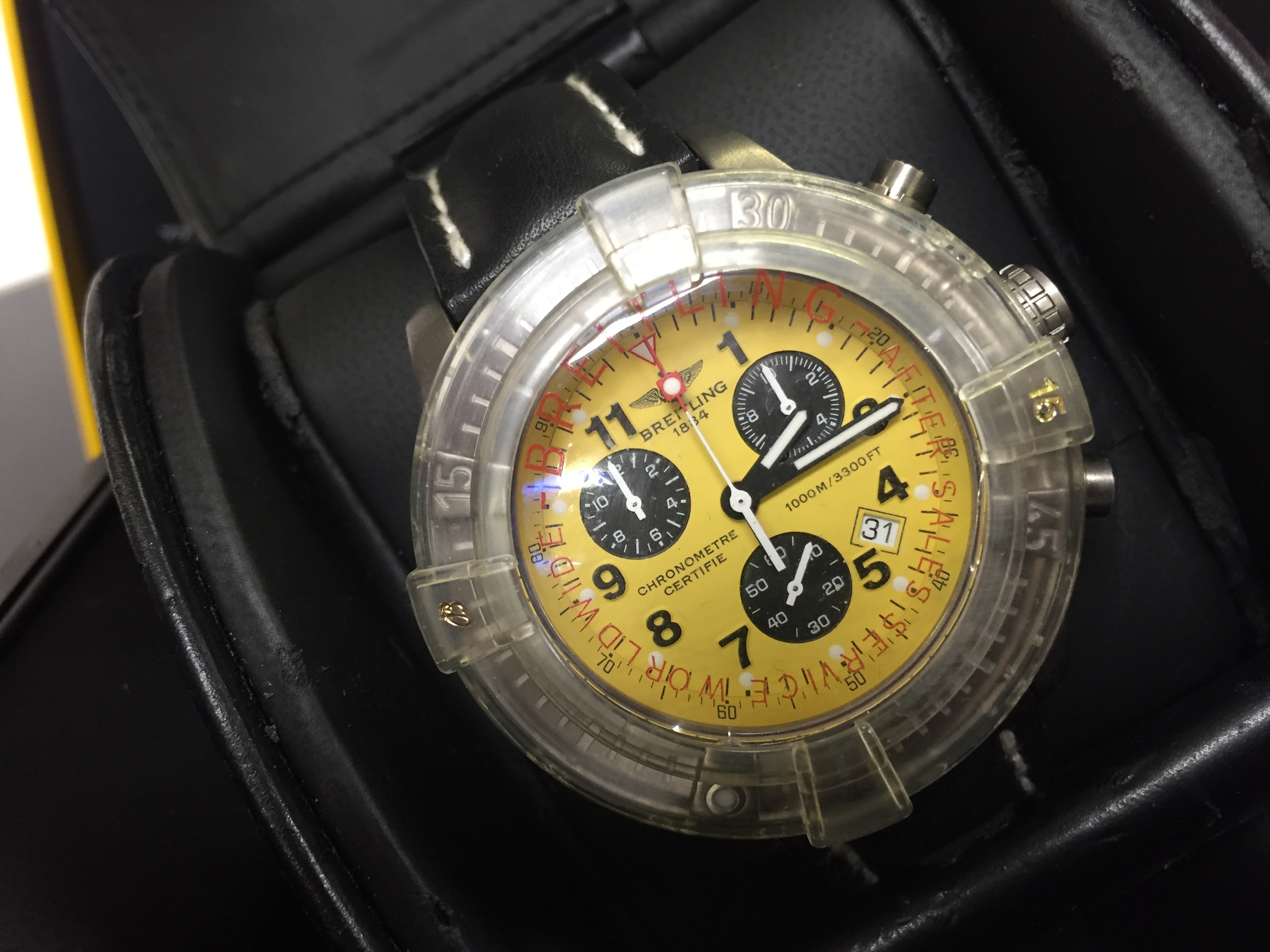 BRIETLING CHRONO AVENGER M1 GENTS WRIST WATCH QUARTZ MOVEMENT 44MM TITANIUM CASE WITH YELLOW ARABIC