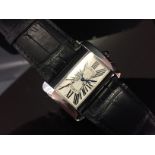 A CARTIER AUTOMATIC GENTLEMAN'S STAINLESS STEEL WRIST WATCH ON BLACK CARTIER LEATHER STRAP,