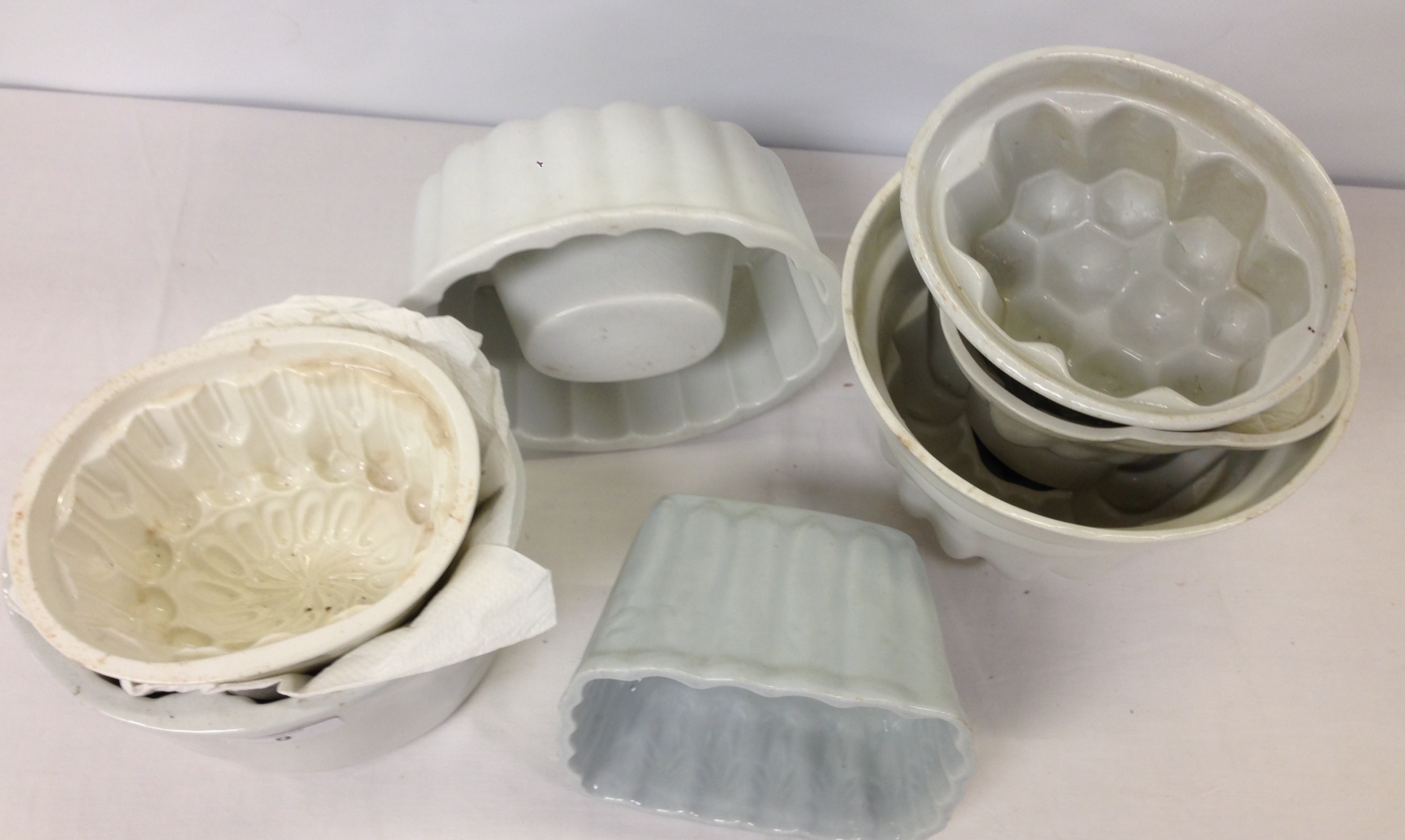 SEVEN ASSORTED WHITE POTTERY JELLY MOULDS - Image 2 of 3