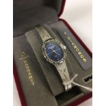 LADY'S CASED "GRUEN" WRIST WATCH, QUARTZ MOVEMENT, BLUE OVAL DIAL WITH BATON MARKERS,
