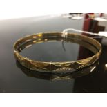 LARGE SIZE 9CT. GOLD BANGLE (APPROX. 20GMS.