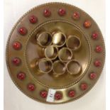 AN ARTS AND CRAFTS COPPER BOWL SET WITH POLISHED ORANGE STONES,