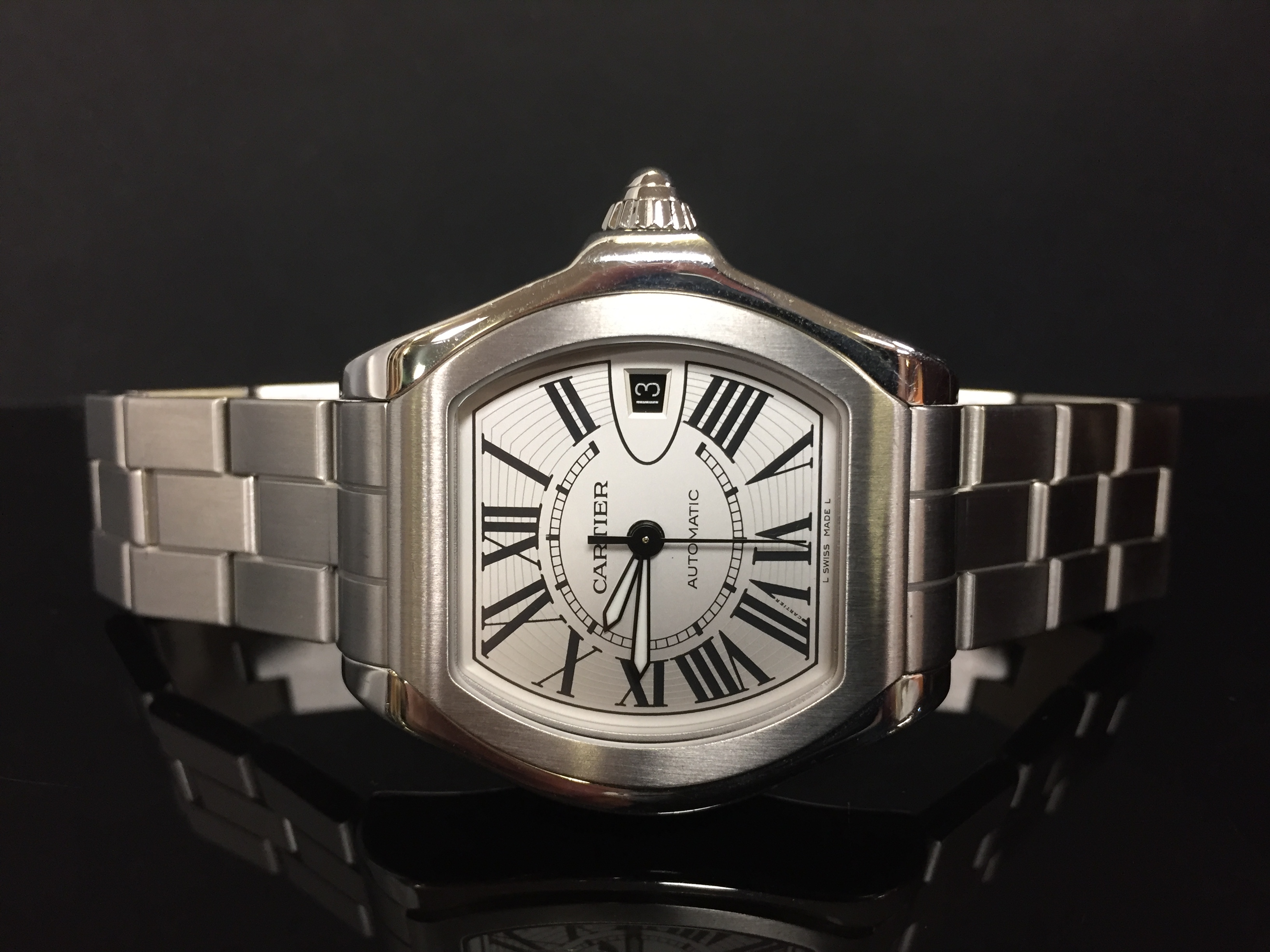 A GENTLEMAN'S CARTIER AUTOMATIC STAINLESS STEEL ROADSTER, SILVER DIAL,