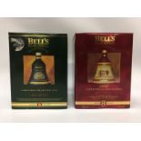 TWO COMMEMORATIVE BELLS EXTRA SPECIAL 8 YEAR OLD WHISKY DECANTERS (70CL.