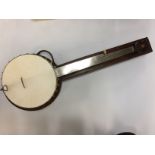 A 5 STRING BANJO BEARING THE IMPRESSED MARK 'A WEAVER' . IN ORIGINAL 1930S QUALITY LEATHER CASE.