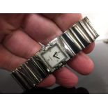 A LADY'S OMEGA CONSTELLATION WITH MOTHER OF PEARL FACE, DIAMOND DOT DIAL AND DIAMOND BEZEL,