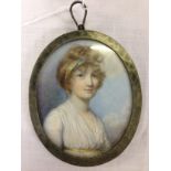 MINIATURE OVAL PORTRAIT OF YOUNG WOMAN BEARING DETAILS TO REVERSE, GERTUDE E.