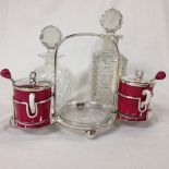 TWO SMALL CUT GLASS DECANTERS ALONG WITH A MAPPIN AND WEBB PLATED BREAKFAST SET,