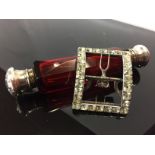 VICTORIAN CRANBERRY GLASS DOUBLE ENDED SCENT BOTTLE AND GEORGIAN SILVER PLATE BELT BUCKLE SET WITH