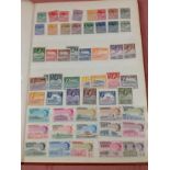 STOCKBOOK MINT ANTIGUA, BAHAMAS, CAYMANS, DOMINICA, GRENADA, JAMAICA, MONTSERRAT ETC.