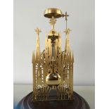 A REPRODUCTION BRASS STEEPLE SKELETON CLOCK UNDER GLASS DOME